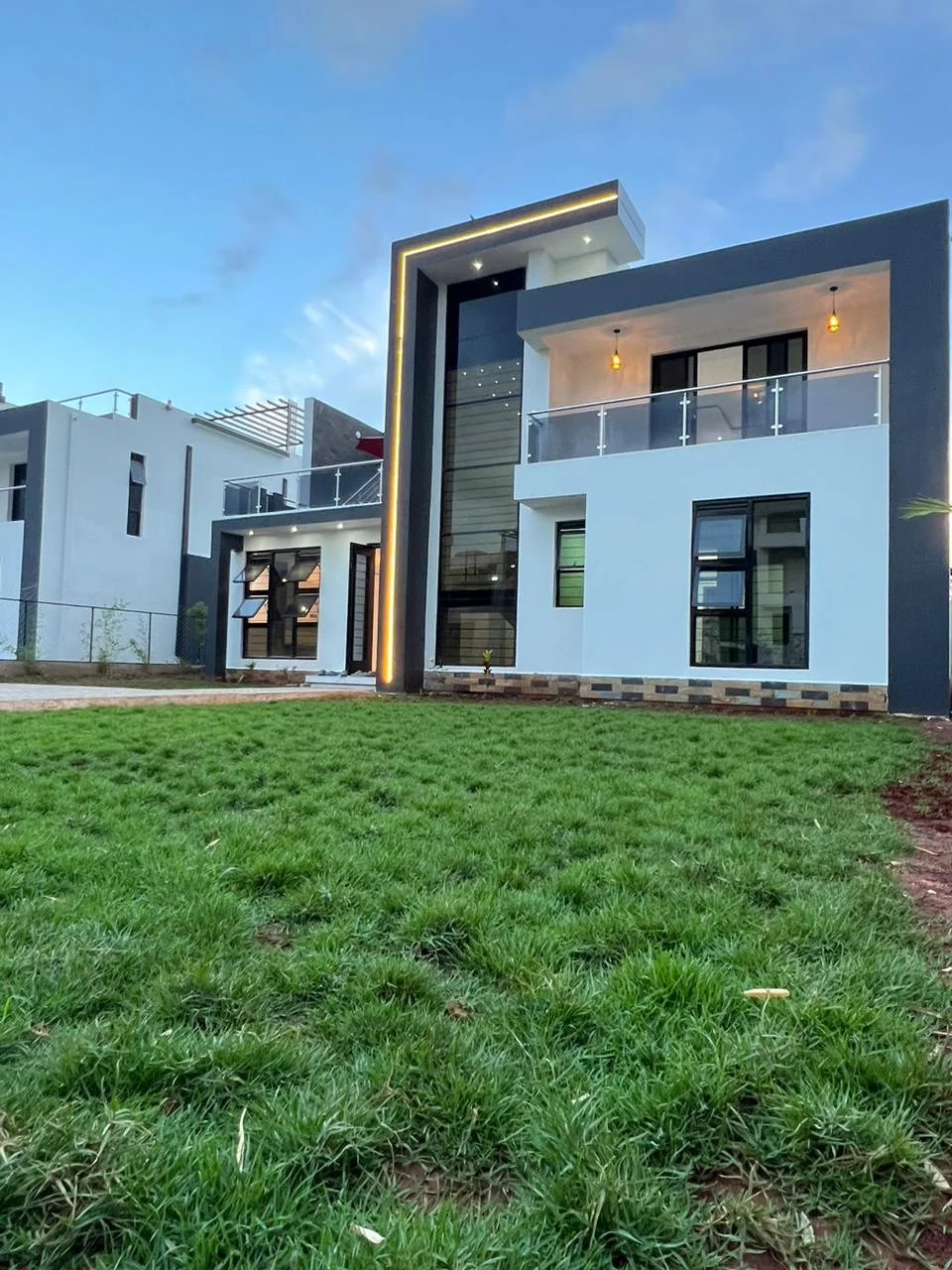 Palm Courts Estates villa at golden hour — premium gated community in Ruiru