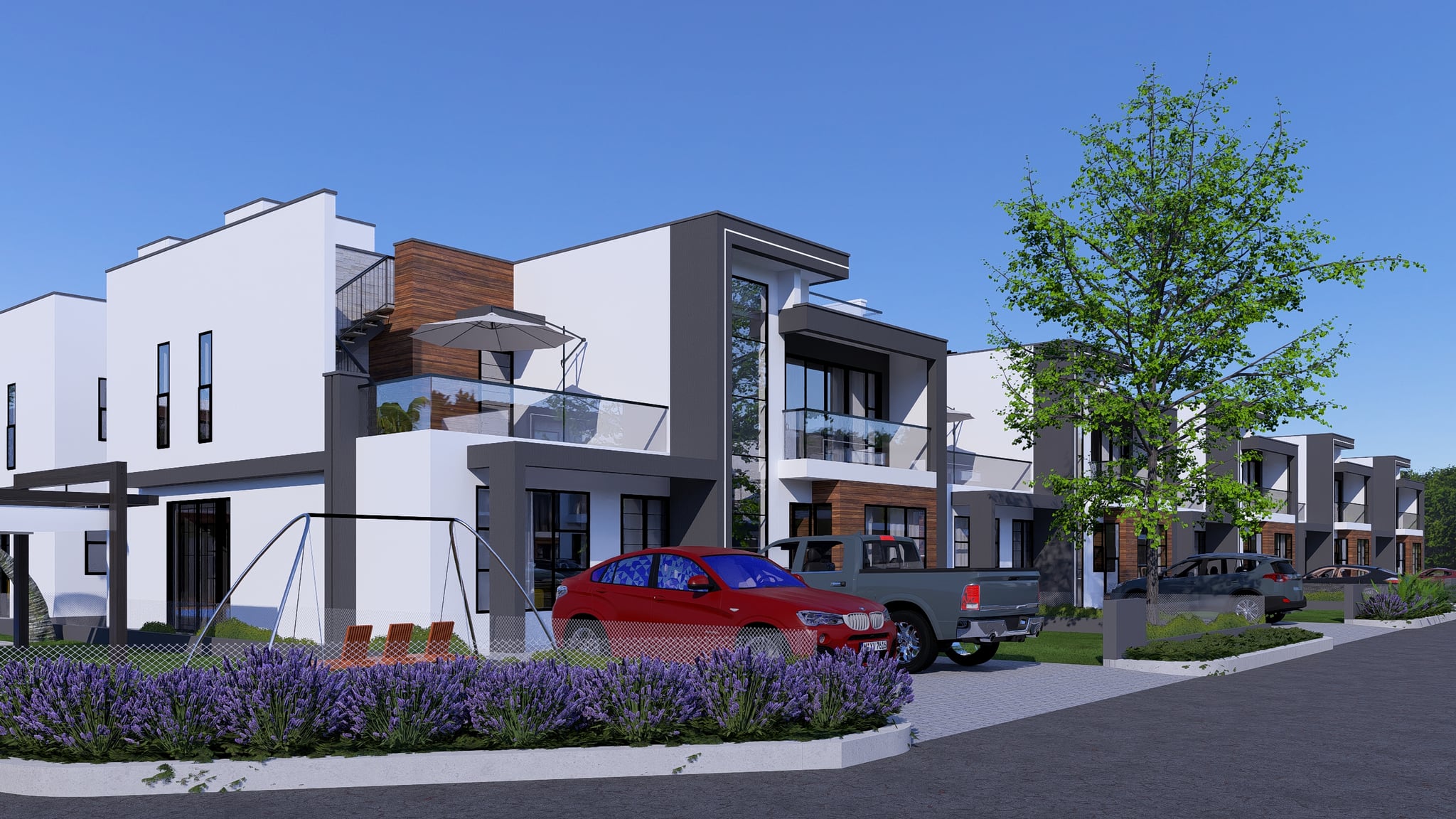 Palm Courts Estates — community street view with play area and landscaping